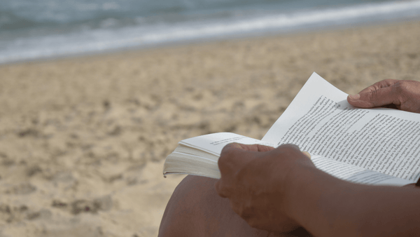 reading book on the beach