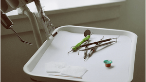 Dentists tools on a plate 