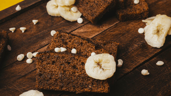 Chocolate and banana bread on a chopping board 