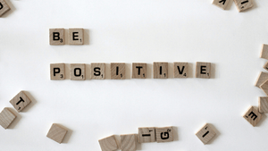 a Be Positive poster 