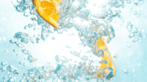 Fresh orange in water