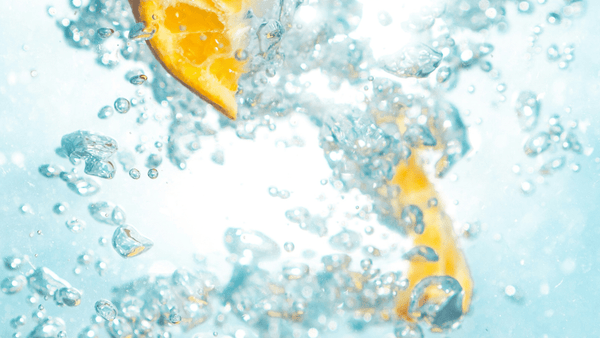 Fresh orange in water
