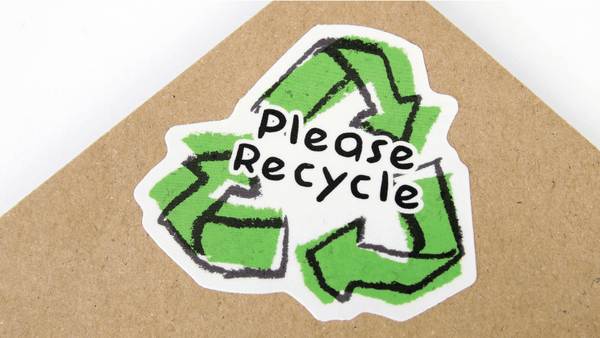 A box with a recycle sticker on 