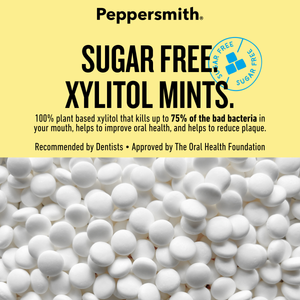 Peppersmith Sugar Free Xylitol Mints packaging graphic with a pale yellow background, large black product text, a blue circular 'Sugar Free' badge, and a close-up photo of many white round mints across the bottom.
