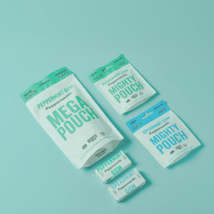 Collection of Peppersmith Gum products. PEPPERMINT MEGA POUCH, PEPPERMINT MIGHTY POUCH, SPEARMINT MIGHTY POUCH, PEPPERMINT GUM, SPEARMINT GUM. On a Blue background